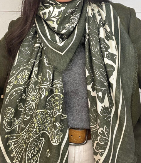 A silk scarf can be used to elevate a person's wardrobe.